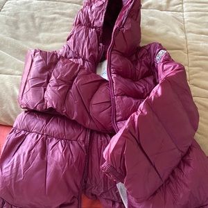 Moncler coat for a little girl.